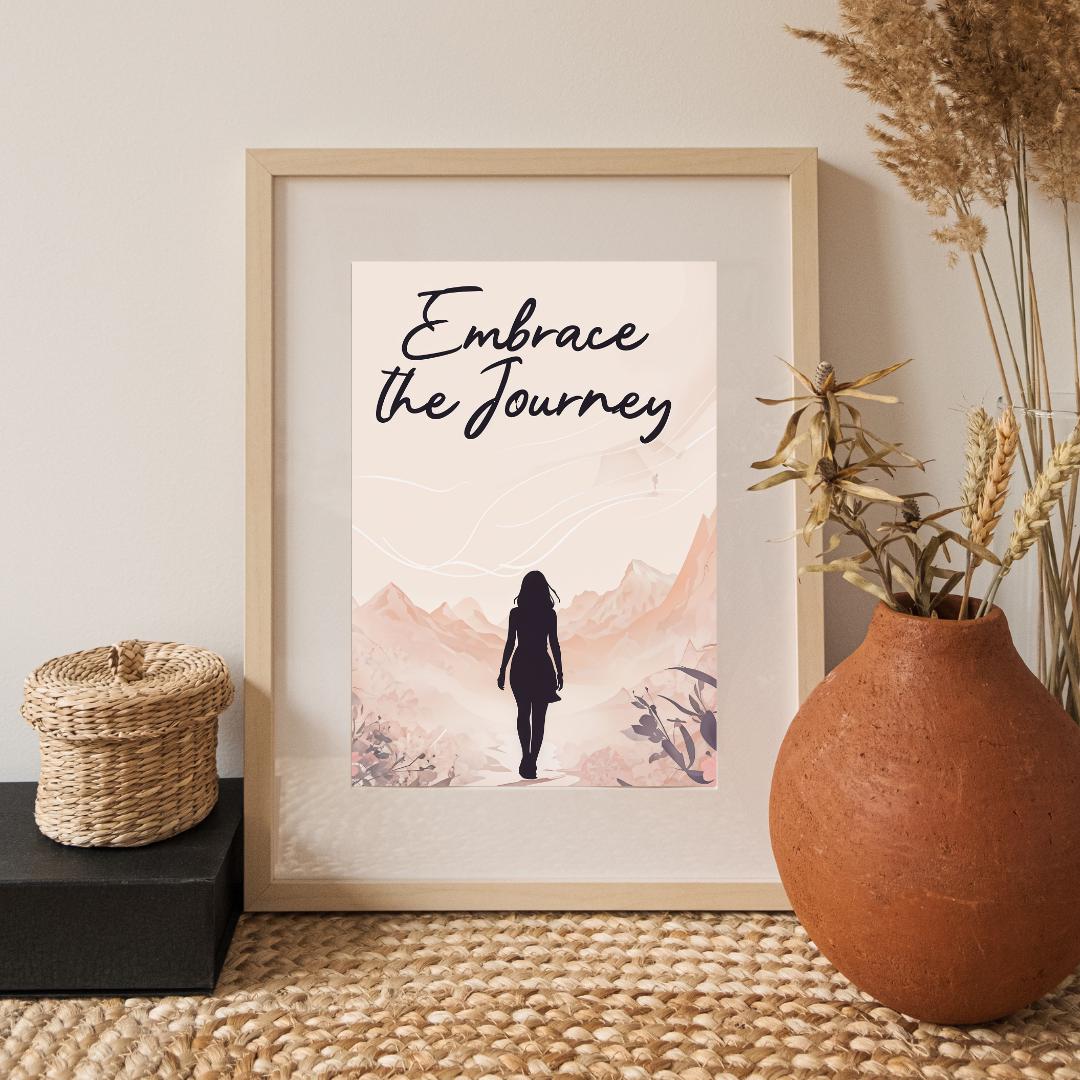 Minimalist poster with the words "Embrace the Journey" in elegant script, featuring the silhouette of a woman walking through a serene mountain landscape in soft, neutral tones. A motivational feminine design symbolizing resilience and discovery.