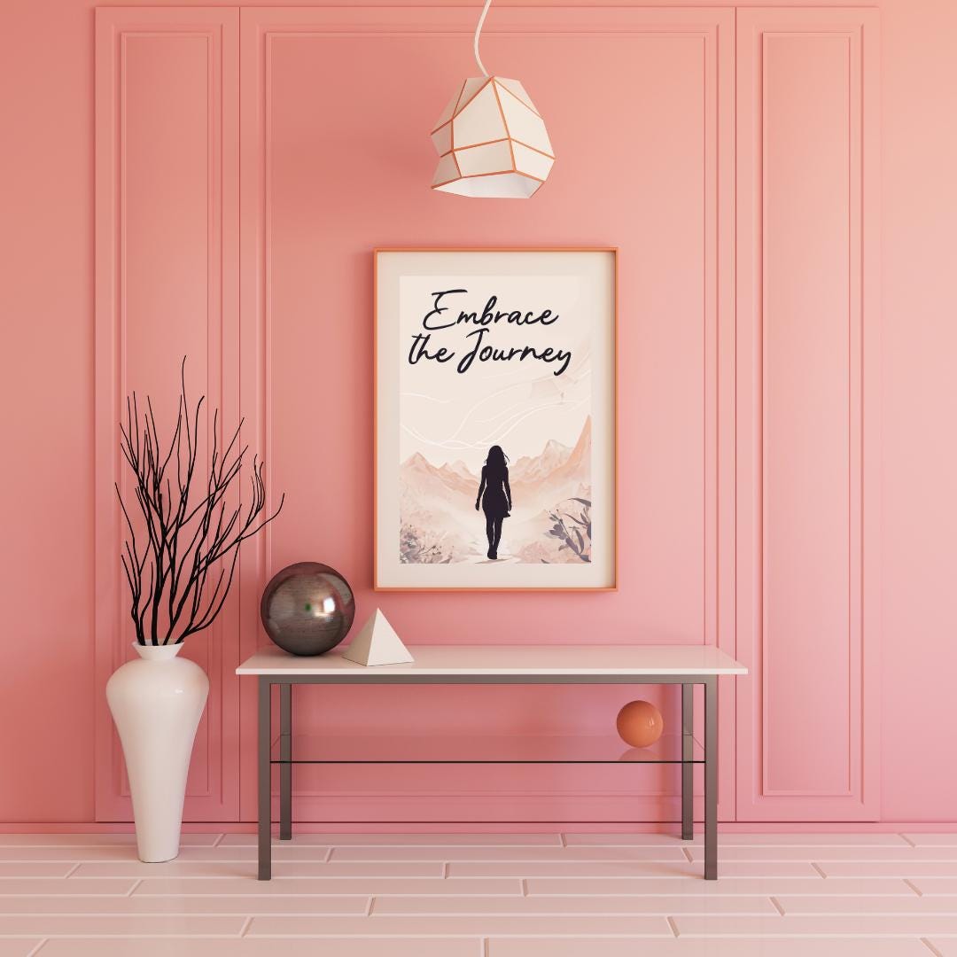 Minimalist poster with the words "Embrace the Journey" in elegant script, featuring the silhouette of a woman walking through a serene mountain landscape in soft, neutral tones. A motivational feminine design symbolizing resilience and discovery.