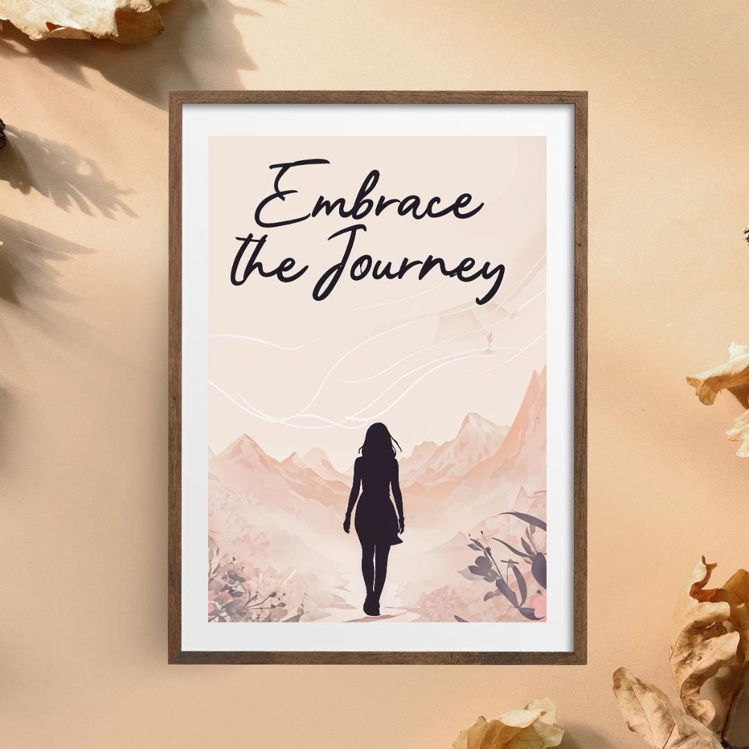 Minimalist poster with the words "Embrace the Journey" in elegant script, featuring the silhouette of a woman walking through a serene mountain landscape in soft, neutral tones. A motivational feminine design symbolizing resilience and discovery.